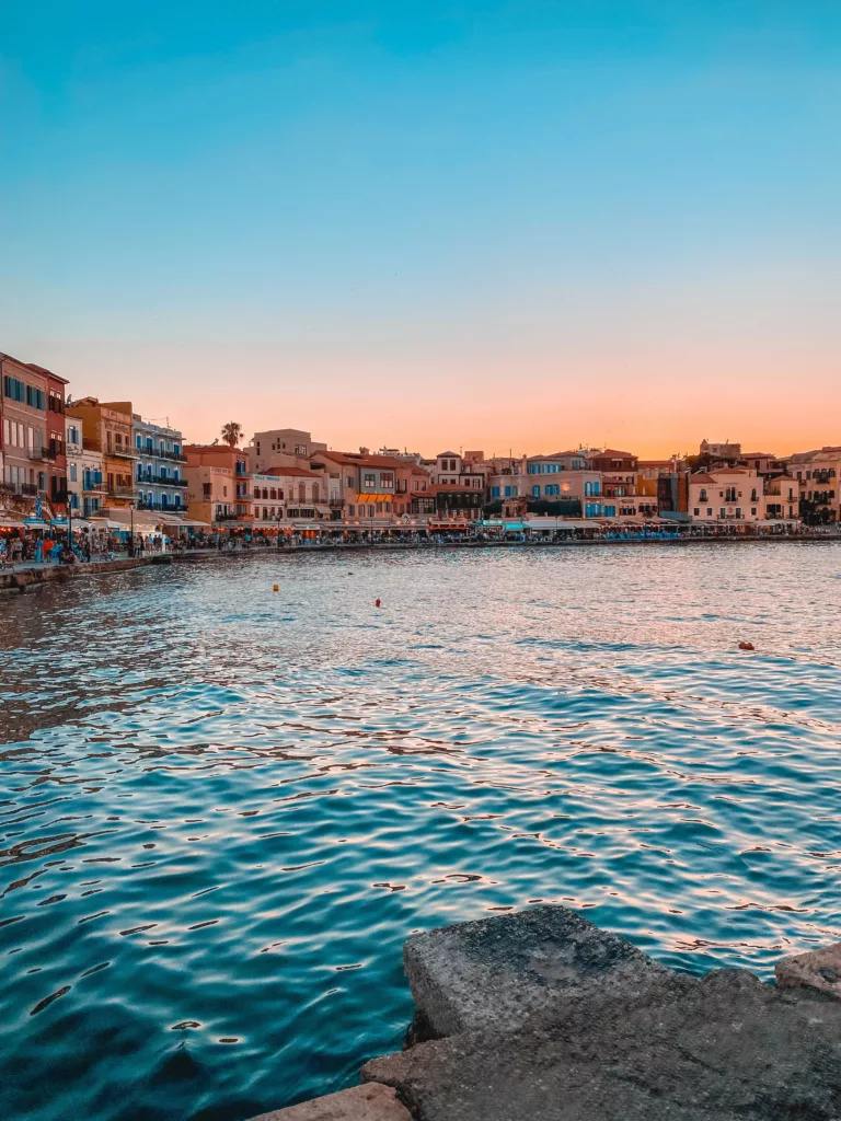 A captivating view of Chania, Crete, showcasing charming Venetian architecture, bustling markets, and the scenic waterfront.